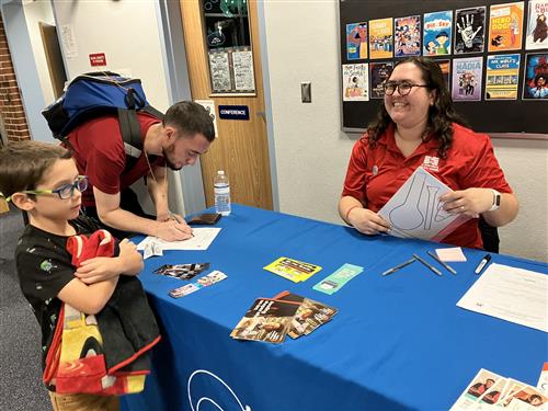 family getting a library card