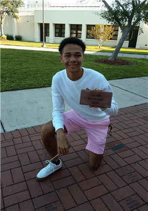 Student with Engraved Brick 