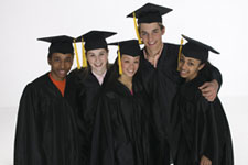 Students wearing caps and gowns for graduation 