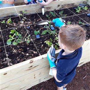 student gardening 