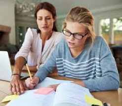 mom and daughter doing homework 