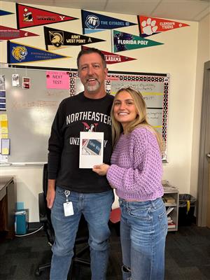 Student thanks Faculty Council member