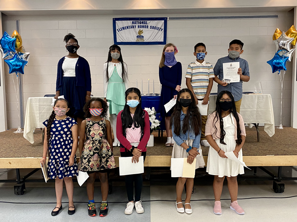 On the eve of Eisenhower Elementary School's 50th Anniversary, 22 of their top fourth and fifth graders were inducted into the school's second annual National Elementary Honor Society (NEHS).