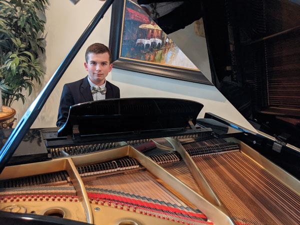 Gibbs High ESE student and piano player Milosz Gasior,performs with ease, but his mother, Bozena Gasior, knows the effort it took to get there.