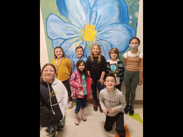 The Art Club at Orange Grove Elementary recently reproduced Georgia O’Keefe’s White Flower 1929 in their third grade hallway. 