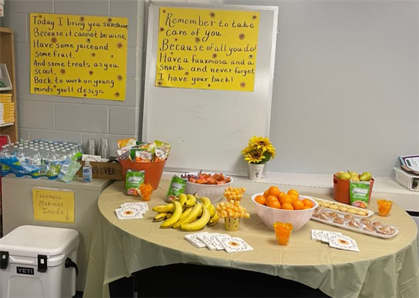 Frontier Elementary MTSS coach Laura Johnson, set up a healthy display of snacks to help keep up school morale.