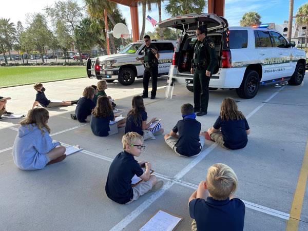 Pinellas County Sheriff’s Deputies Rita Bishop and Alex Siem visited Gulf Beaches Elementary School for the Great American Teach In.