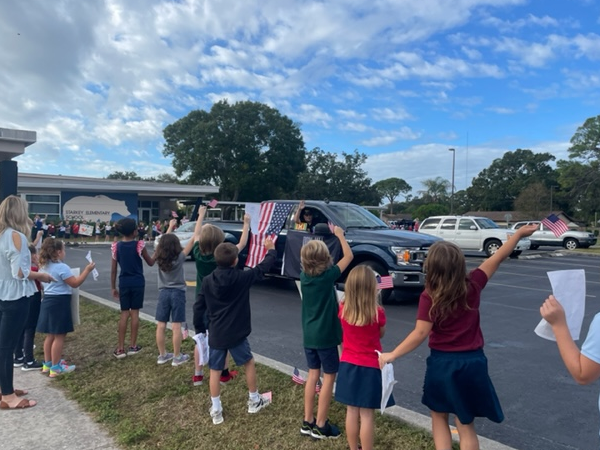 Starkey Elementary held a drive by celebration to honor their veterans on Veterans Day.