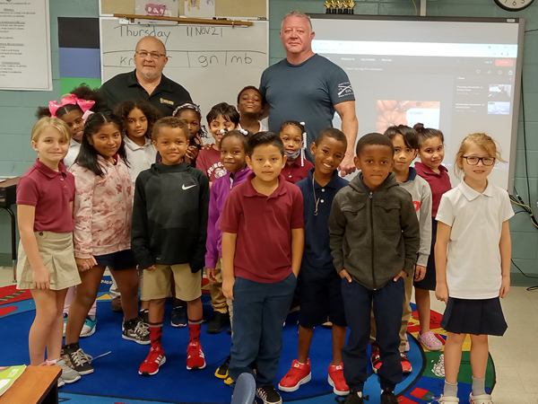 Tarpon Springs Elementary held a Veterans Day Celebration where they presented a special certificate and pin to second grade teacher, Mr. Culverhouse, for his services in the United States Navy.