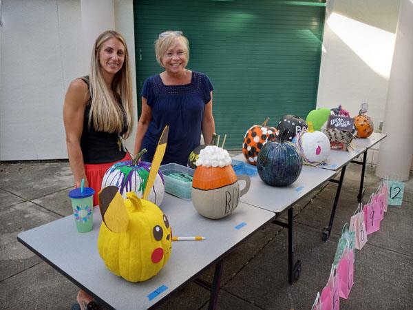 Frontier Elementary held a Trunk or Treat Event. Kindergarten teachers Julia Paolillo and Jamie Seay worked the pumpkin raffle.