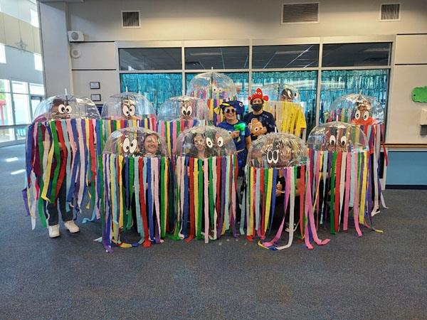 Office staff at Paul B. Stephens dressed up as Jellyfish and the administrators dressed as Dori and Nemo for the school's 2021 Halloween parade. 