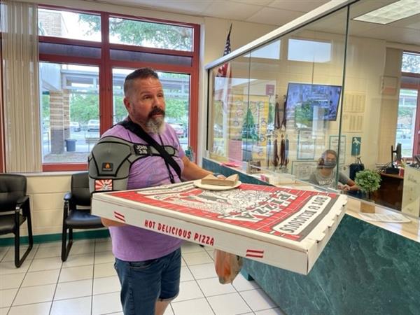 Our mentors give everything they’ve got and more to their students. Mentor, Dean Giancola brought a ginormous pizza to his student at Carwise Middle School.