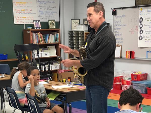 Plumb Elementary had a saxophone player visit  during the Great American Teach In.