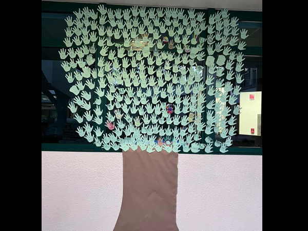 Mrs. Ford and students at Frontier Elementary created a see something, say something week promise tree.