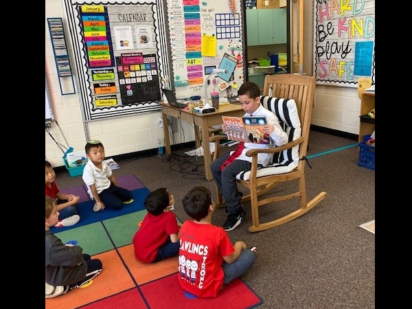 M.K. Rawlings Elementary 5000 Role Model boys read to kindergarten and 1st grade classes.