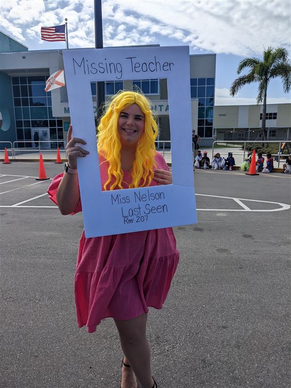 Teachers Showing Off Their Costumes at Trunk-or-Treat