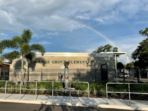 A rainbow appears over Orange Grove Elementary.