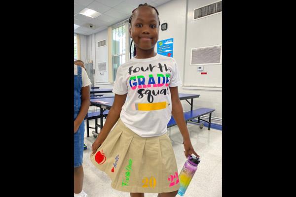 Lakeview Fundamental 4th Grade student, Amira Harris shows her excitement for start of the new school year with her Fourth Grade Squad outfit.