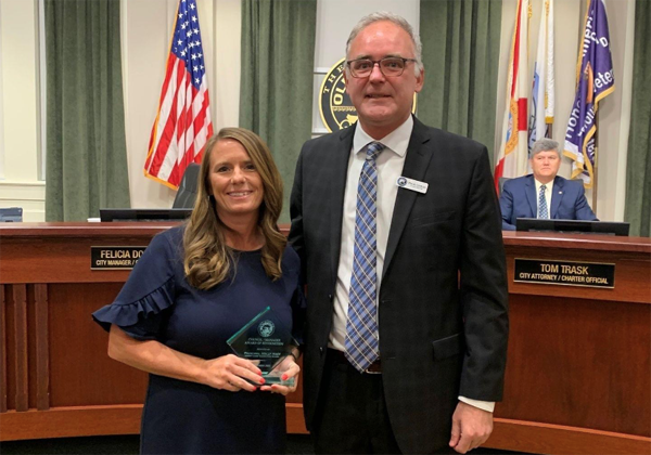 Oldsmar Council Member Steve Graber presented Forest Lakes Elementary School Principal, Holly Huey the Council-Manager award for her positive impact on student growth.