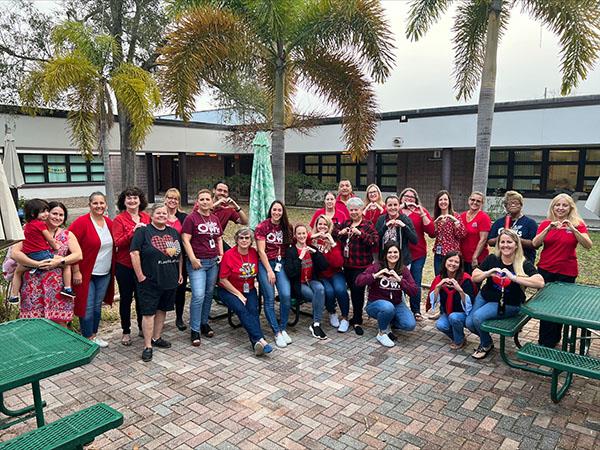 Southern Oak Elementary staff dressed in red for Heart Disease Awareness Support.