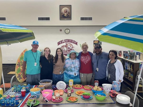 Walsingham Elementary Specialists Team set up the spring break snacks for the staff meeting.