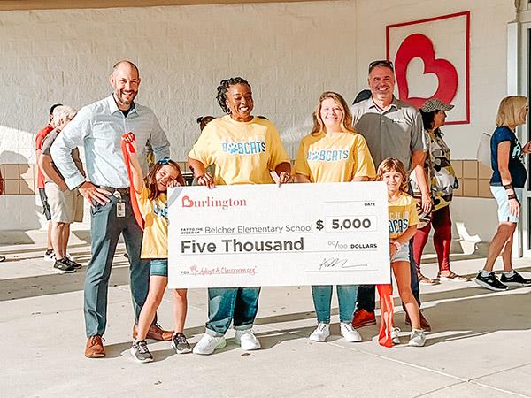Burlington presented Belcher Elementary with a $5,000 donation at their grand opening at the Palm Harbor location. 