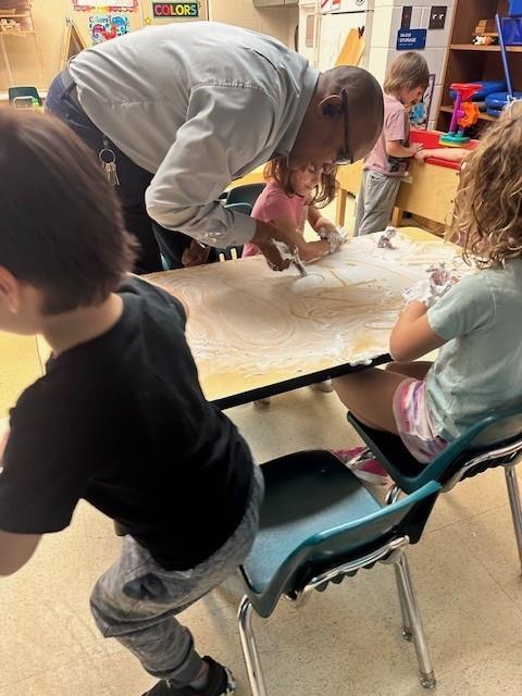 Principal Crawford practiced his letters and numbers with fellow Stingrays at Sunset Hills Elementary.