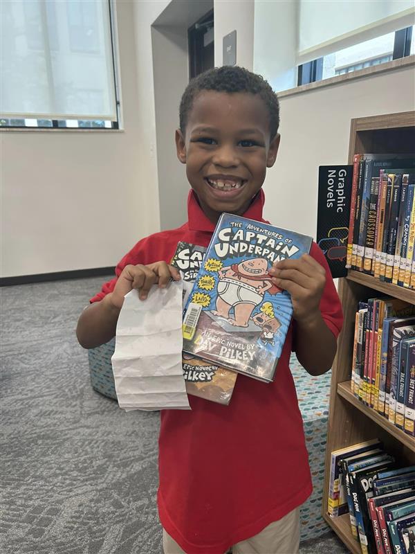 2nd Grader Enjoying the Midtown Academy Library