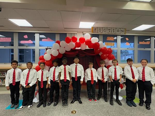 M.K. Rawlings Elementary students were inducted into the 5000 role models during the induction ceremony. The young gentlemen are committed to making a difference in their own lives and those of others.