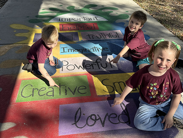 Garrison Jones Elementary students headed into school with a little hopscotch with a positive message.