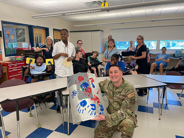Nina Harris ESE Center had a visit from TSgt. Matthew Santilli, from MacDill Airforce Base during the Great American Teach-In.